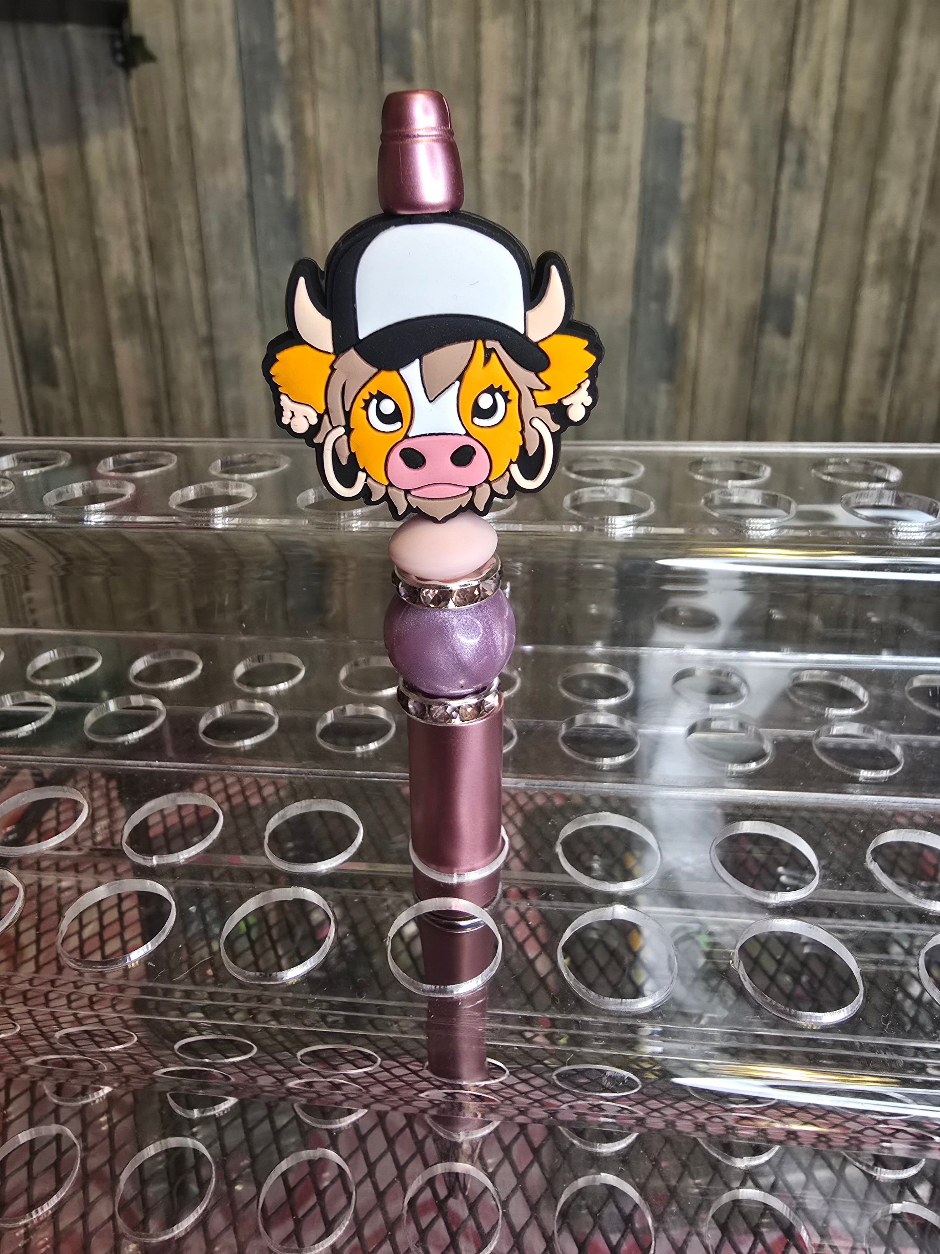 Cow with earings pen